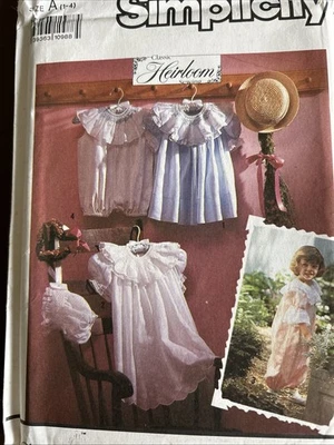 Simplicity Patterns 7135 Toddlers Dress And Romper and Bonnet Sz 1-4 - Image 1 of 3