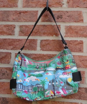 Bolso de Hombro Mini Monedero Multicolor y Diseños Correa Negra Forro Rosa Foto 1 de 4