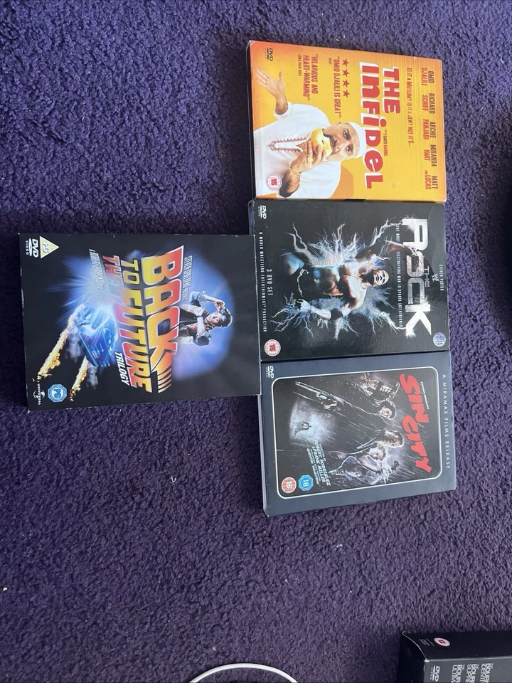 The Infidel And The Rock And Sin City And Back To The Future DVD Mix And Math - Image 1 of 1