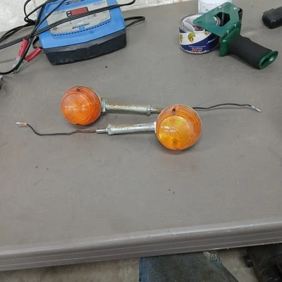 Pair 1974 Honda CB360 FRONT TURN SIGNAL INDICATOR  - Image 1 of 4
