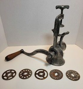 Antique cast iron Gem Food Chopper with (5) original discs, patented in 1899