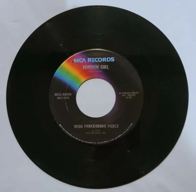 Webb Pierce Debbie Pierce Foreign Girl / What The People Say vinyl 45 rpm record - Image 1 of 2