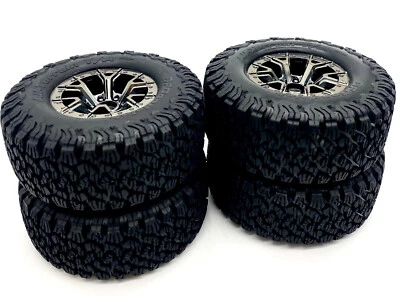 Fits Traxxas Raptor R TIRES (F/R WHEELS (4) Assembled 10187 T/A® KO2 101076-4 - Image 1 of 3