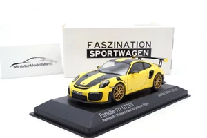 #413067229 Minichamps Porsche 911 (991.2) GT2 RS - Weissach - Racing Gelb - 1:43 - Picture 1 of 3
