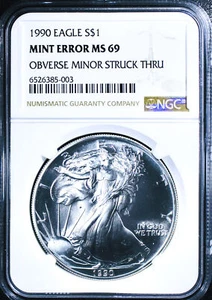 1990 American Silver Eagle - Mint Error Obverse Struck Through - NGC MS-69 - Picture 1 of 4