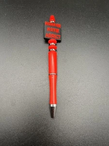 Pluma roja adicta a películas de terror - Imagen 1 de 4