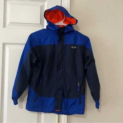 Chaqueta cortavientos azul y negra C9 by Champion para niños talla M 8-10 forro de malla con capucha Foto 1 de 4