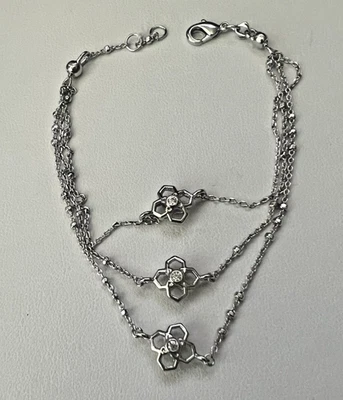 Brazalete Kendra Scott Rue Triple Hilo Chapado en Rodio Tono Plata Foto 1 de 4