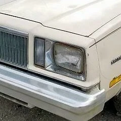 Bisel faro izquierdo cromado Buick Skylark: 1982, 1983, 1984, 1985 Foto 1 de 4