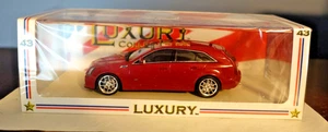 Luxus Neu in OVP 2011 Cadillac CTS-V Wagon Crystal Red 1:43 Die Cast #101249 - Bild 1 von 3