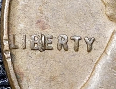 1957 MINT ERROR  WHEAT CENT Penny ('BIE'  IN LIBERTY) - Image 1 of 4