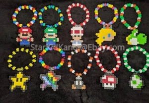 Neu 6 Mario Bros Armbänder Nintendo Luigi Yoshi Nova Mushroom EDM EDC - Bild 1 von 5