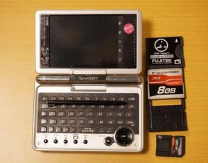 SHARP ZAURUS SL-C3200 CF replacement Manual & CD & AC included - Photo 1 sur 9