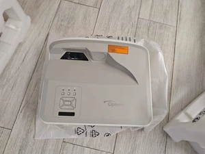 Optoma ZU500USTe Laser Projector 5000 Lumens WUXGA Ultra Short Throw – Brand New - Picture 1 of 4
