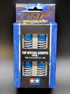 TAMIYA # 300042102 - TRF ALUMINIUM STOSSDÄMPFER SET (4) 55MM "FLUORINE COATED" - Bild 1 von 2