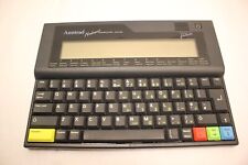 AMSTRAD NC100 NOTEPAD COMPUTER & WORD PROCESSOR WITH LEATHER COVER