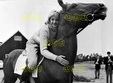 Photo - Mandy Rice-Davies on horseback, candid portrait, Stockholm, 1964