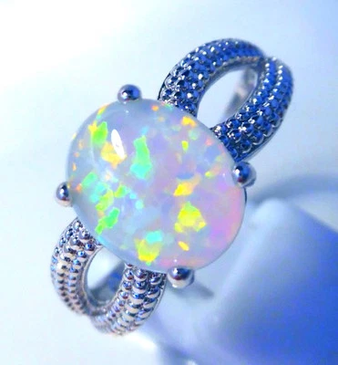 GORGEOUS WHITE  FIRE OPAL  RING UK Size "N" US  7 - Image 1 of 2