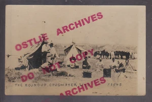 Chugwater WYOMING RPPC c1910 COWBOY ROUNDUP Cattle Drive EATING MEAL Camp WY - Picture 1 of 4
