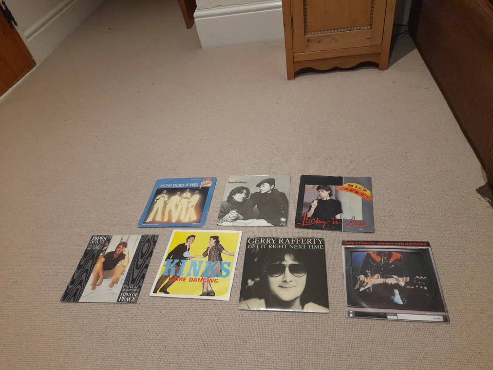 Collection of 7 Rock 7" vinyl Records The Kinks Mick Jagger John Lennon Slade - Image 1 of 1