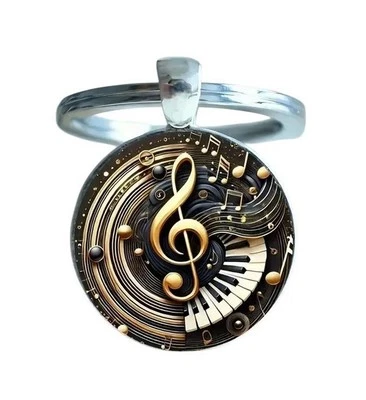 Porte-clés, bijou de sac cabochon imprimé clé de sol et clavier piano. - Photo 1/4