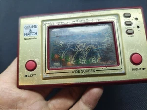 Juego y reloj Nintendo OCTOPUS OC-22 1981 vintage para pieza o reparación - Imagen 1 de 7