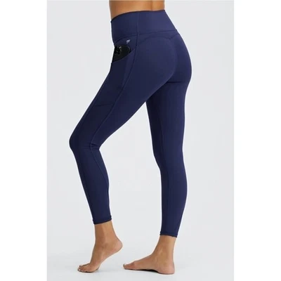 Leggings Fabletics PureLuxe para mujer Oasis cintura alta 7/8 con bolsillos pequeños azules Foto 1 de 4