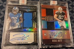 2023 Panini NFL Obsidian Jahmyr Gibbs and Legacy Michael Mayer RC Auto Lot of 2 - Bild 1 von 2