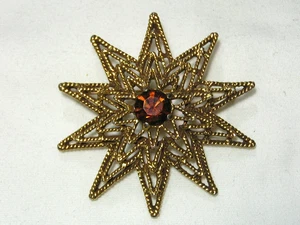 Vintage signed TARA..Layered Design Gold Tone, Dark Amber Rhinestone Star Brooch - Picture 1 of 7