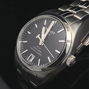 Reloj Tissot PR 100 suizo automático esfera negra 33 mm acero inoxidable damas fecha 5" - Imagen 1 de 9