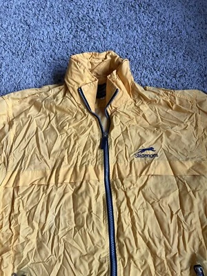 Chaqueta cortavientos vintage Slazenger cremallera completa grande amarilla lluvia Foto 1 de 4