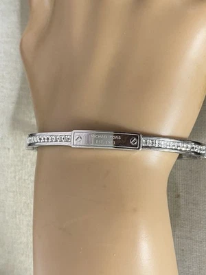 Signed Michael Kors Silver Plated Bangle Bracelet Pave Baguette Swarovski 6.75” - Image 1 of 4