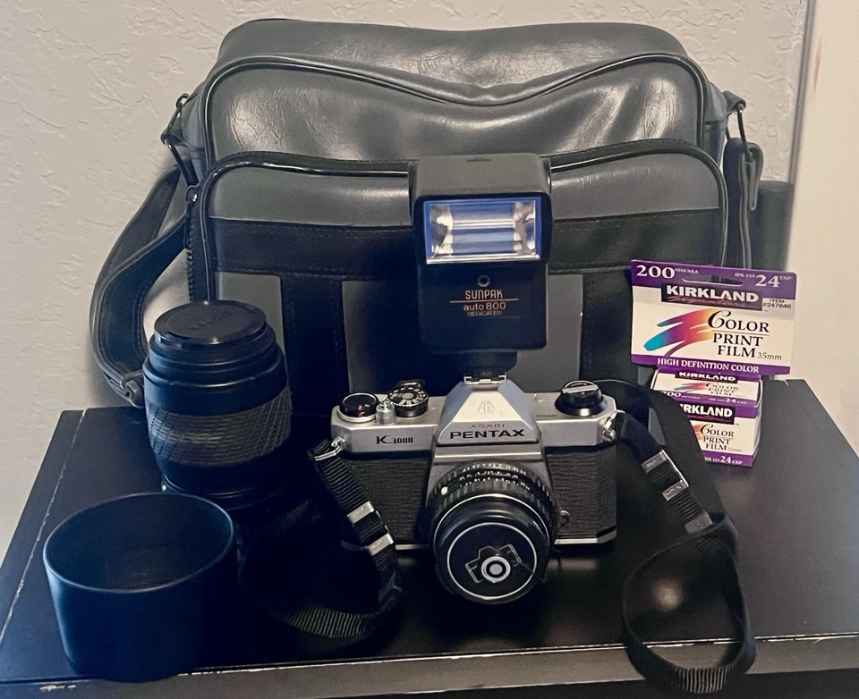 Cámara fotográfica Pentax K1000 35 mm SLR con lentes de 70-210 mm y Pentax de 50 mm funciona en muy buena condición Foto 1 de 4