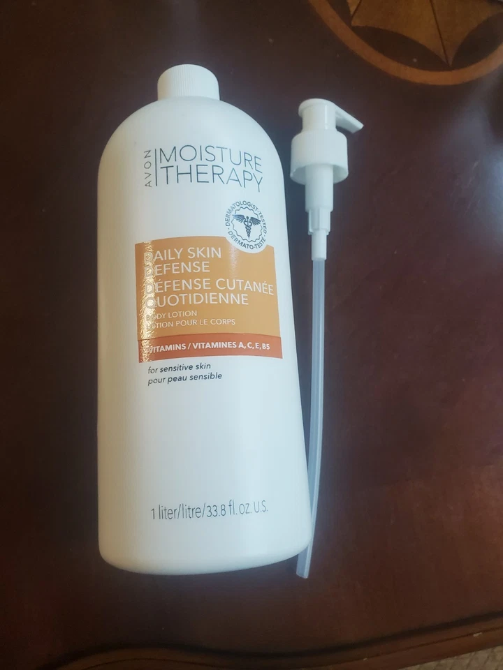 Avon Moisture Therapy Daily Skin Defense Body Lotion w/pump, 33.8 fl oz. - Image 1 of 1