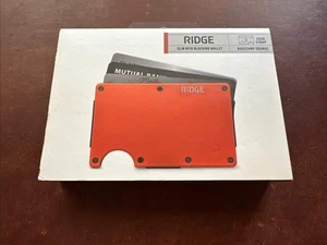 Cartera delgada con bloqueo RFID The Ridge con correa para efectivo - Basecamp naranja - SELLADA - Imagen 1 de 3