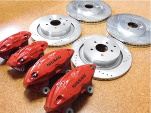 NISSAN OEM FRONT REAR CALIPERS & PADS & DRILLED BRAKE ROTORS KIT FOR G37 Q50 Q60 - Bild 1 von 3