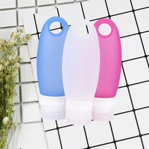Botellas de silicona de viaje para artículos de tocador champú colgante recargables - Imagen 1 de 11