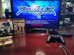 EXTRAS! Soul Calibur II 2 (Sony PlayStation 2) Complete with Action Replay Disk - Picture 1 of 11