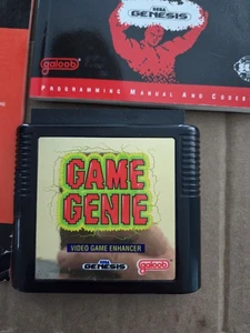 Game Genie Video Game Enhancer (Sega Genesis, 1992) Gold Label With Update Books - Picture 1 of 4
