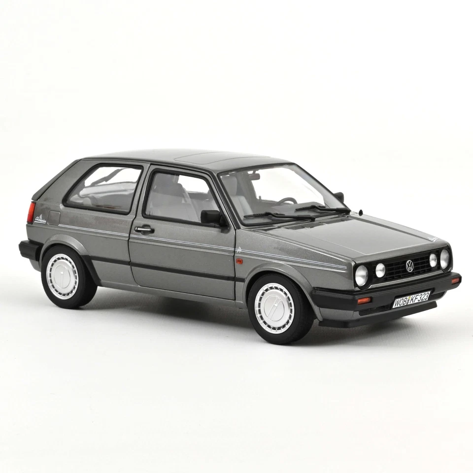 * VOLKSWAGEN GOLF C HAMPION 1990 Voiture gris métallisé car- 1/18 NOREV 188564 - Photo 1/4