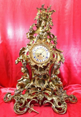 Antique French Mantel Clock Gilt Bronze Circa 1870's With Putti Figurines Cover