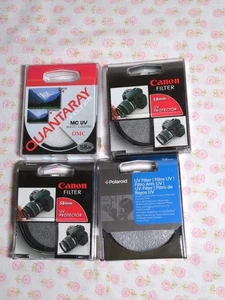 LOT of 4 Canon, Quantaray 58mm UV Protector Filter Lens In Cases for 35mm Camera - Picture 1 of 3