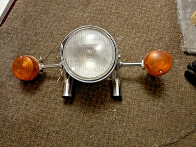 74-76 Kawasaki KZ-400 Faro, intermitentes y soportes Foto 1 de 4