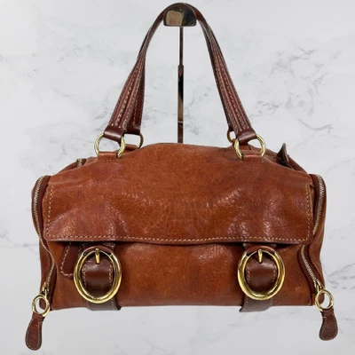 Dolce Gabbana 棕色皮革手提包 Y2K 波士顿单肩包金色装饰 — 第 1/4 张图片