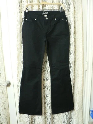 + PANTALONES NEGROS GRANE JUNIORS TALLA 5 (28x31) - 8" tiro bajo - elásticos - acampanados - usados en excelente estado Foto 1 de 4