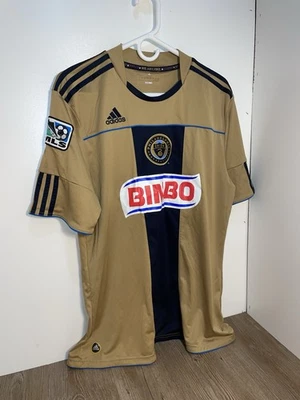 Camiseta de fútbol visitante Philadelphia Union rara talla L para hombre Adidas dorada Foto 1 de 4