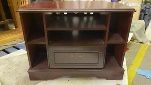 tv cabinet made of wood and in good condition. - Picture 1 of 4