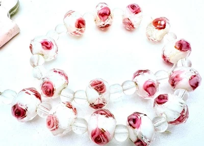 Long Strand Of Faceted Glass Rondelle Beads With Pink Flower Accents 10mm - Image 1 of 2