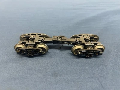 Mth Die-Cast 2 Sprung Black Trucks & Brake Hoses w/ Screw (Pair of 2) - Image 1 of 2