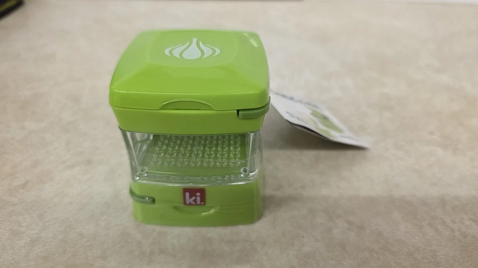 Kitchen Innovations Prensa de ajo pelado ajo, trituradora, cortadora, picadora, verde Foto 1 de 1